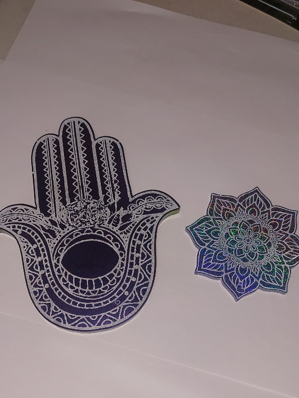 Decorative Hamsa Hand and Floral Mandala Resin  Set Iredecent Black On Back .
